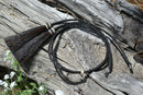 Close Up View Western Style 1/4" wide and 24" long, braided horse hair eye glass holder (gator/leash) with tassels. Black