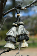 Close Up View 4" triple mule tail cut Double Tassels. Handmade horsehair dyed in bright colors as well as natural.      Grey/Black/White