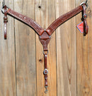 Reinsman Heavy Duty 2" Heavy Oil Double Ply Harness Leather Breast Collar with Hand Carved Arizona Flower tooling with spots.  Stainless steel hardware and tugs and cinch drop.   1" x 12" adjustable tugs. 