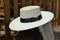 Atwood Hat Company - 4.25" Flat Brim Buckaroo Style Hat - Long Oval - 7X Palm Leaf - Designed with a buckaroo brim, the flat brim with a slight tilt down in front and curl up in the back.  Hatband is a wide black ribbon with traditional bow.