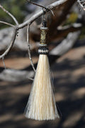 Close Up View 4 1/2" total length horsehair zipper pull with spring clip. Handmade horsehair various colors and beading pattern. White-Silver/Gold/Silver