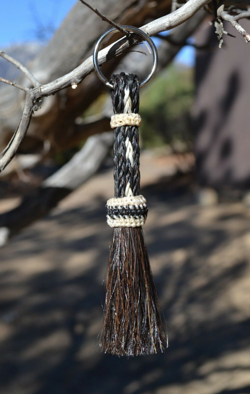 Close Up View 3/8" wide, 3 Strand Braided Horsehair Key Chain. This shorter style is 5 1/2" including the key ring.   Black/White