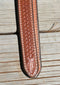 Super Close Up View Beautiful Jose Ortiz Braided Rawhide Quirt Whip with Hitched Horsehair Knots and Hand Tooled Leather Popper. Natural colored rawhide with turquoise blue and black details. 