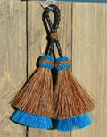 Close Up View 3" Double mule tail cut natural and brightly colored tassels. Handmade from horsehair dyed in bright colors as well as natural.    Brown/Turquoise
