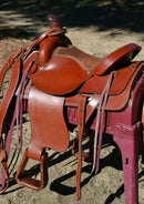 16" Dakota Roping Saddle with tan suede seat.   Includes flank set, martingale style breast collar, plain headstall and reins.  Full set ready to ride.  Smooth finish medium oil.  Square skirts.  