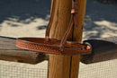 Close Up View Tooling Jose Ortiz has made these 1" wide beautiful light russet oil bridle leather adjustable western training cavesons with hand carved basket weave tooling.     Stainless steel buckle attachment has plenty of crown adjustment.  Noseband and adjusts from 20"-22" around.