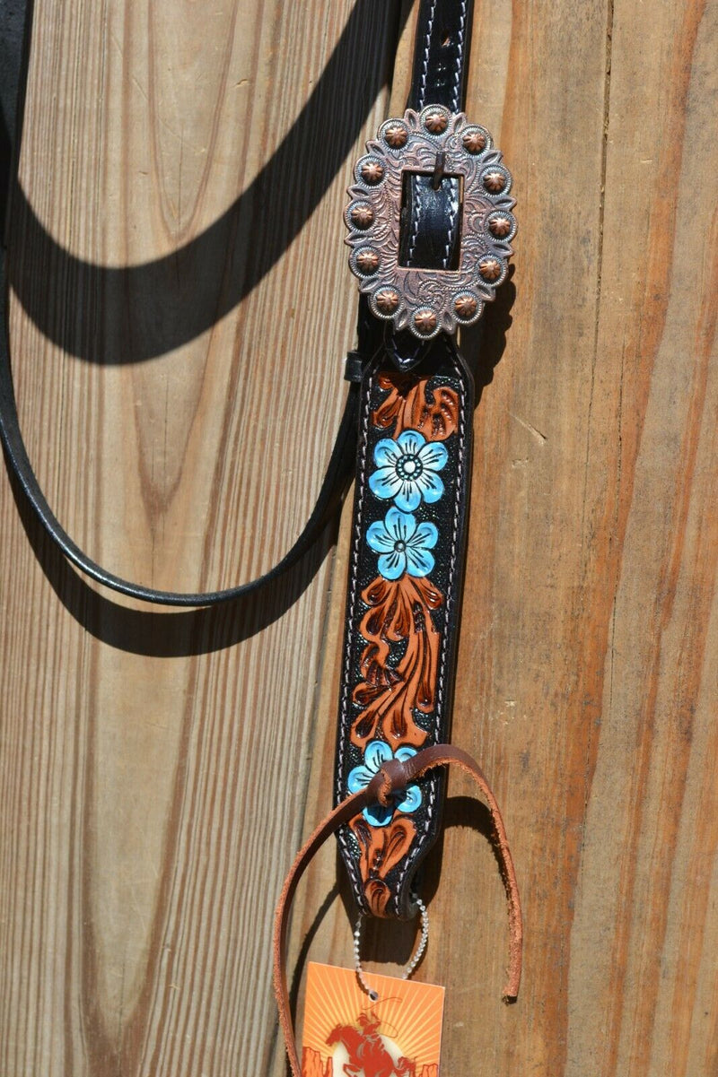 Close Up Buckle Circle Y of Yoakum -  2021 Hand Painted Blue Flower Browband Headstall.   Headstall is walnut with vintage background.    Horse sized, the crown measures 44" from bit end to bit end on the longest setting and adjustment to make up to 8" shorter.   