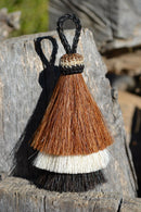 Close Up View 3" 3 bell mule tail cut natural and brightly colored tassels. Handmade from 100% horsehair.   Chestnut/White/Black