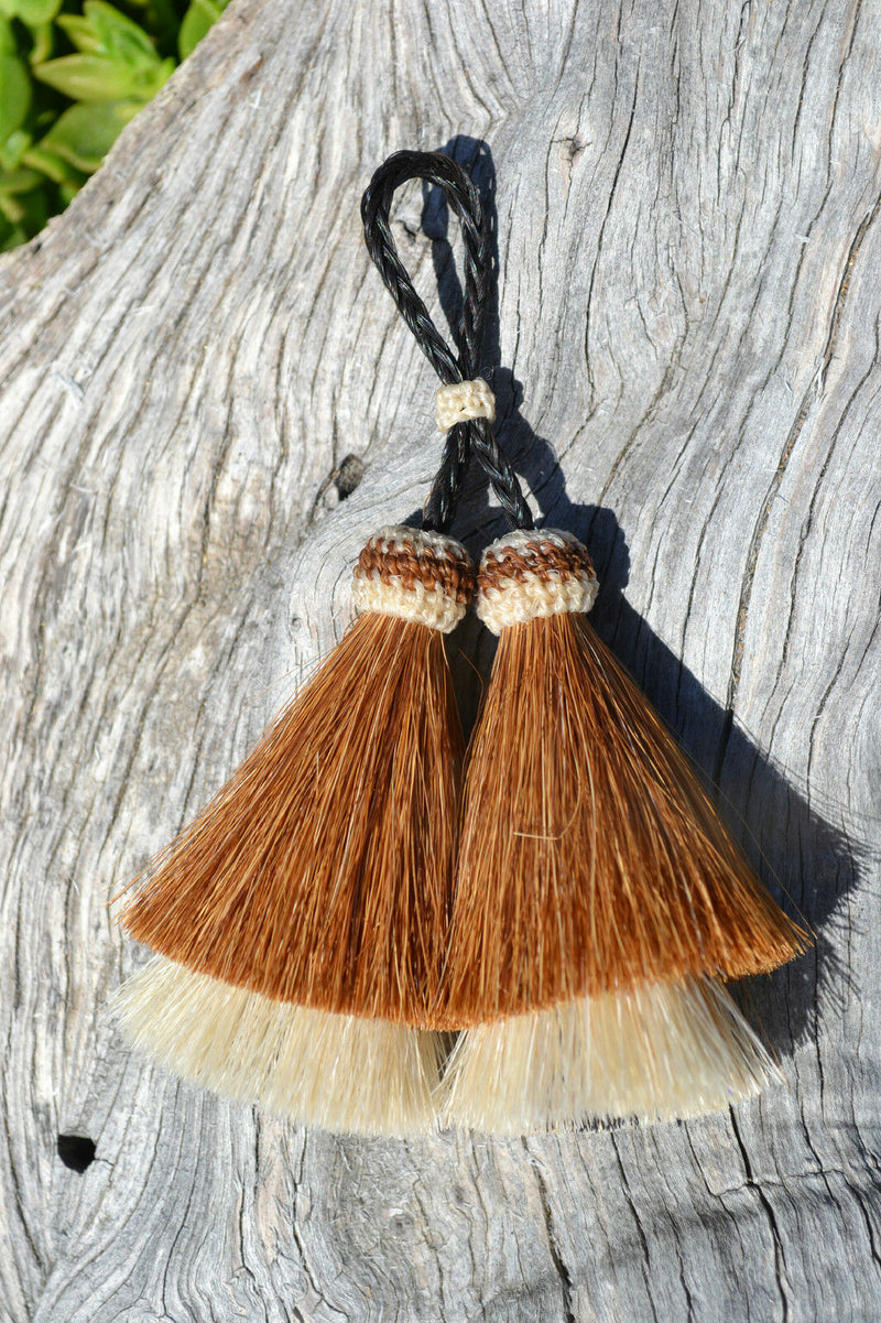 Close Up View  3" Double mule tail cut natural and brightly colored tassels. Handmade from horsehair dyed in bright colors as well as natural. Brown/White