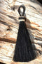Close Up View 3" - 4 1/2" total length natural horsehair tassels. Handmade with 1 1/2" braided horsehair knot loop.    Black