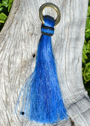 Close Up View 6" - brightly colored shu-fly tassels with 1" brass ring. Handmade from 100% natural mane horsehair dyed in bright colors.   Blue