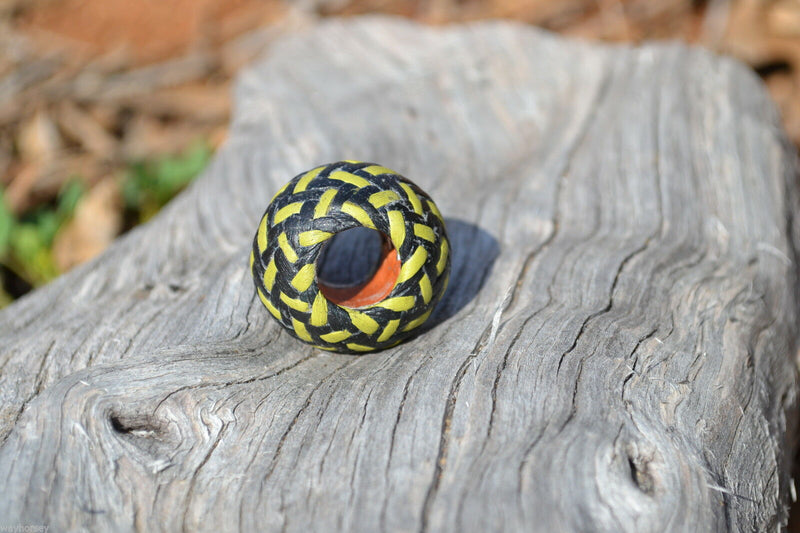 Detail View Lime/Black  Hand braided rawhide scarf slide. Custom made in two-tone combinations of black and bright colored leather braided in a custom "checkerboard" pattern.