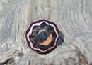 Hand braided rawhide scarf slide.  Custom made in two-tone combinations of black and bright colored leather braided in a "zig zag" pattern.                   Pink/Black