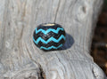 Hand braided rawhide scarf slide.  Custom made in two-tone combinations of black and bright colored leather braided in a "zig zag" pattern.Turquoise/Black